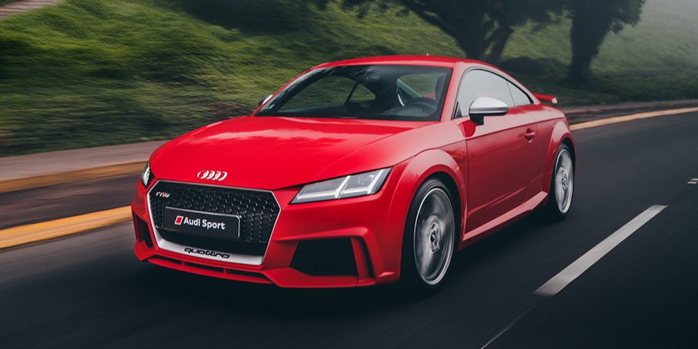 Red Audi TT Quattro on the road